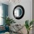 Duże okrągłe lustro dekoracyjne Elegance w salonie glamour. GieraDesign