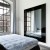 Lustro Modern SQ Black - lustro prostokątne w czarnej ramie ze szkła lacobel, aranżacja w nowoczesnej sypialni - GieraDesign