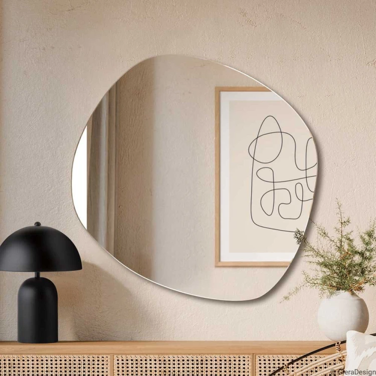 Obłe lustro Roco Wide nad komodą. GieraDesign