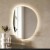Lustro LED nieregularny kształt, Plama no.2, nad komodą w salonie. GieraDesign