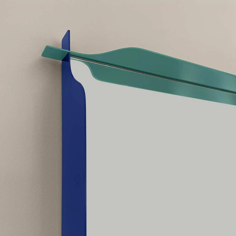 Zbliżenie na lustro prostokątne w kolorowej ramie Monda Flo od GieraDesign.