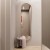 Lustro owalne miedziane Ambient Slim w korytarzu. GieraDesign