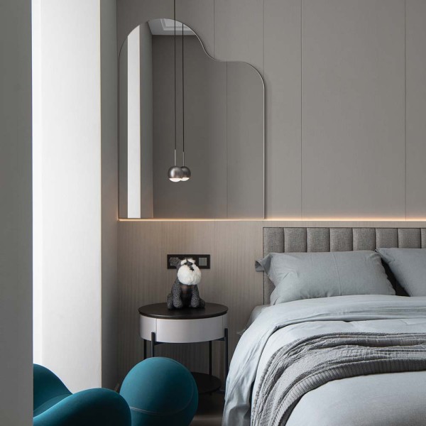 Lustro prostokątne Sierra z falą w sypialni.