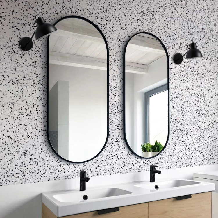 Owalne lustro Ambient Slim - w czarnej ramie do łazienki, Dwa lustra zawieszone nad umywalką w modnie zaaranżowanej łazience, na ścianie lastryko - zgodnie z najnowszymi trendami. GieraDesign