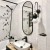 Lustro Ambient Slim owalne w czarnej ramie w nowoczesnej łazience z lastryko. GieraDesign