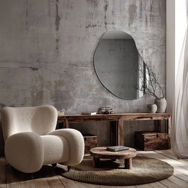 Lustro asymetryczne Plama no.3 o nieregularnym kształcie nad komodą w salonie. GieraDesign